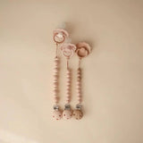 Mushie attache-sucette Hera blush 70.066.01