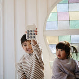 Mushie téléphone pop-up sensoriel 70.049.02