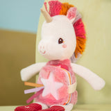 Lilliputiens peluche phosphorescente et livre en tissu Lena la licorne 83664