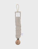 Noukie's attache-sucette universelle en coton bio beige BB2660.81
