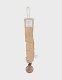 Noukie's attache-sucette universelle en coton bio sable BB2660.82